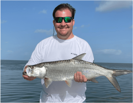 Man holding Tarpon