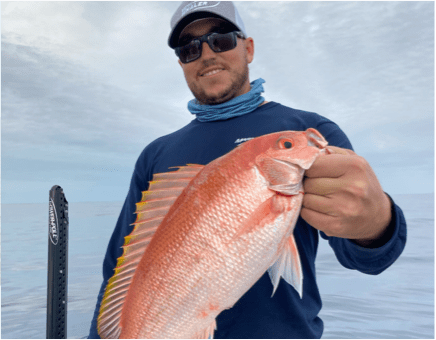 Man posing with Vermillion Snapper