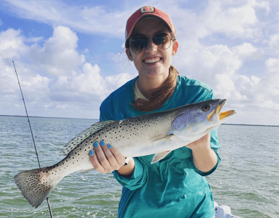 Woman holding a fish