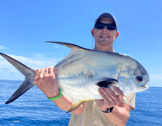 Man holding a fish