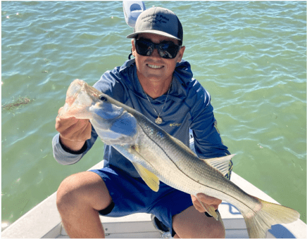 Man holding a Snook