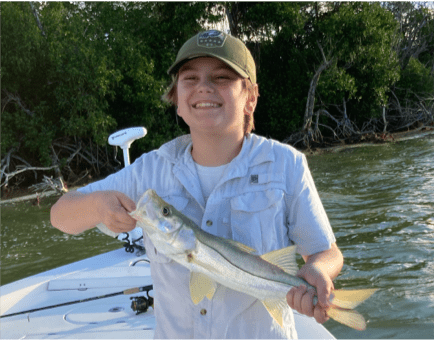 Woman holding a Snook